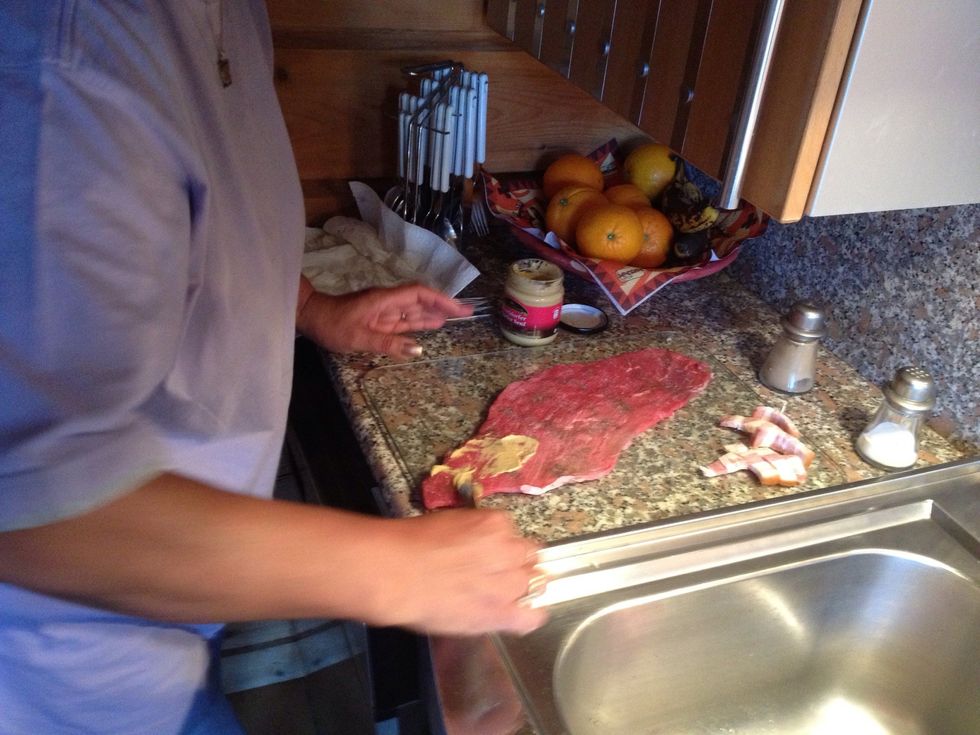 Spread your mustard, small layer all over your meat...