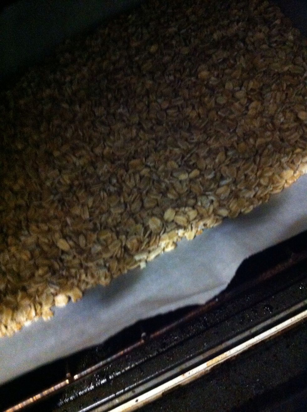 Spread your oats out evenly on the same cookie sheet and toast for a similar amount of time in the oven, making sure they don't burn...