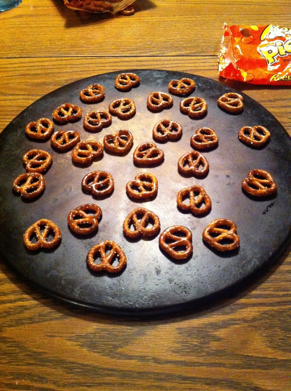 Spread your pretzels out evenly on your cookie sheet.