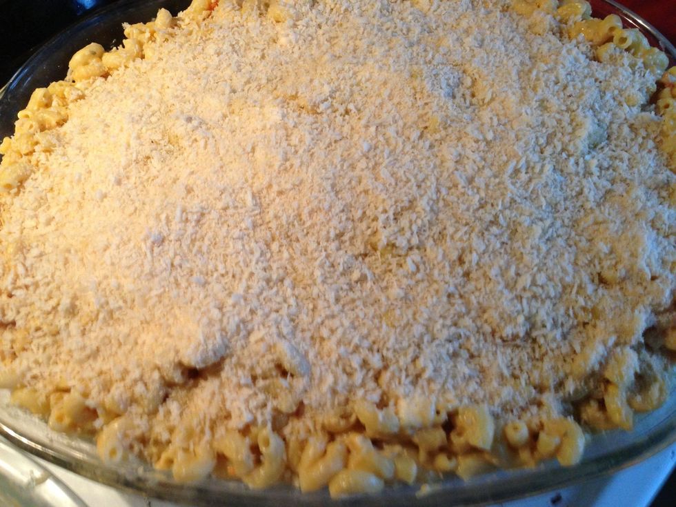 Sprinkle 1/4 cup Parmesan and 1/4 cup Panko on top.