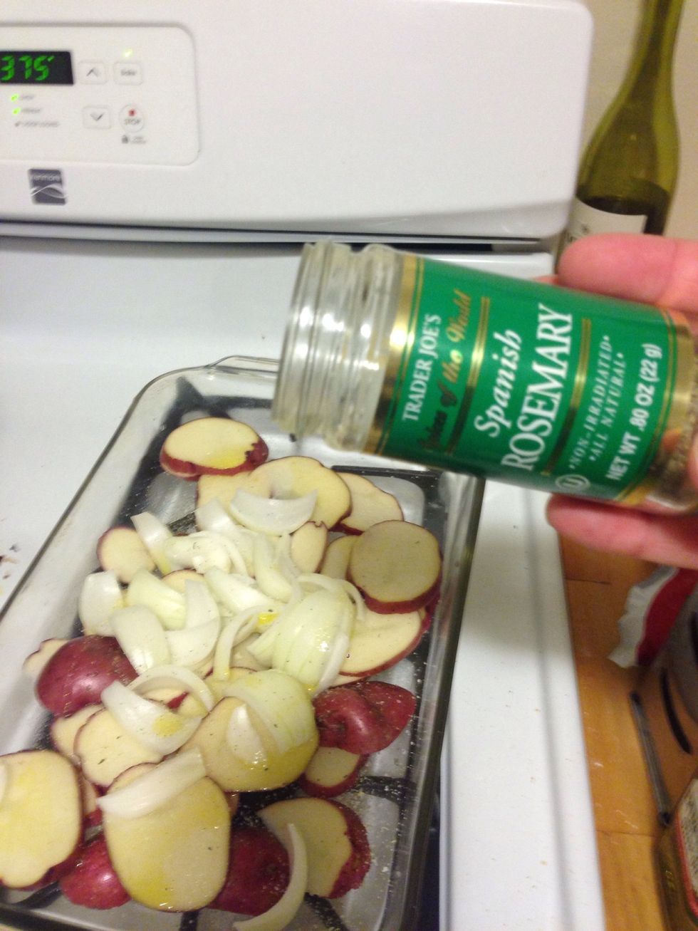 Sprinkle 1 tbsp of rosemary on the potatoes. You can use more if you like. ;)