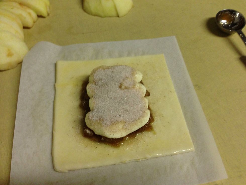 Sprinkle 3/4 tsp spiced sugar on top of goat cheese.