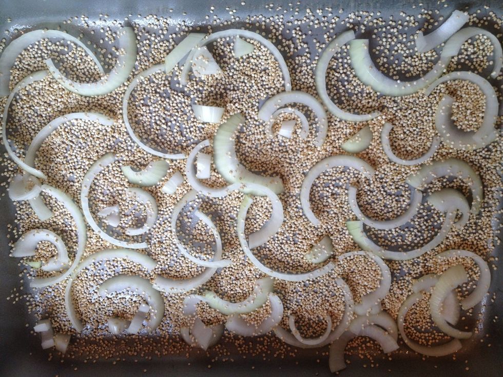 Sprinkle a light layer of dry quinoa on the bottom of the pan. It will absorb the liquid from the vegetables while they're baking and prevent your dish from becoming watery.