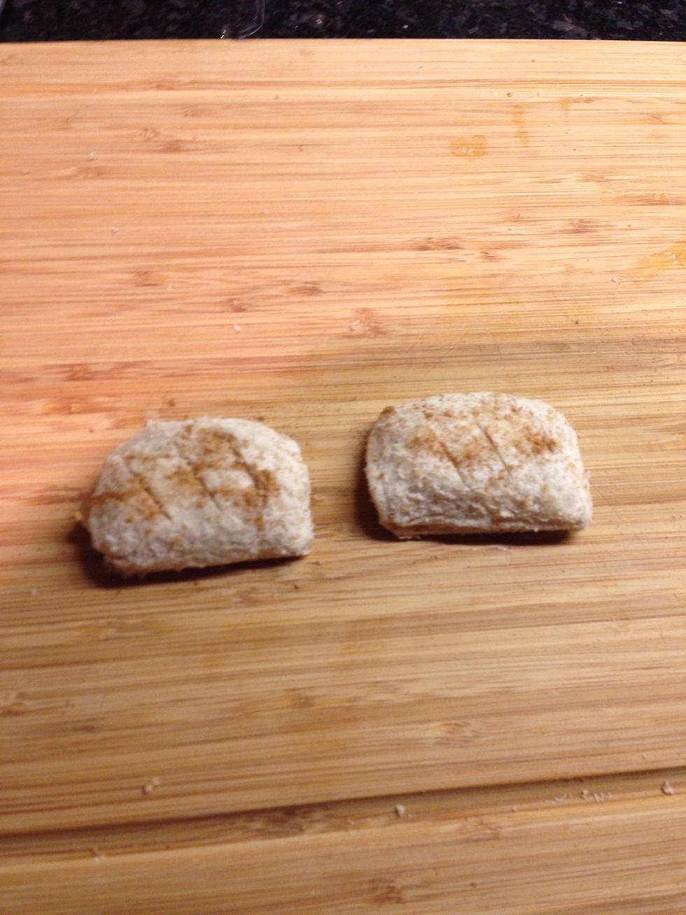 Sprinkle a tiny bit of Cinnamon on each Pie and gently rub into the top. You do not have to add Cinnamon but it makes it taste even better.