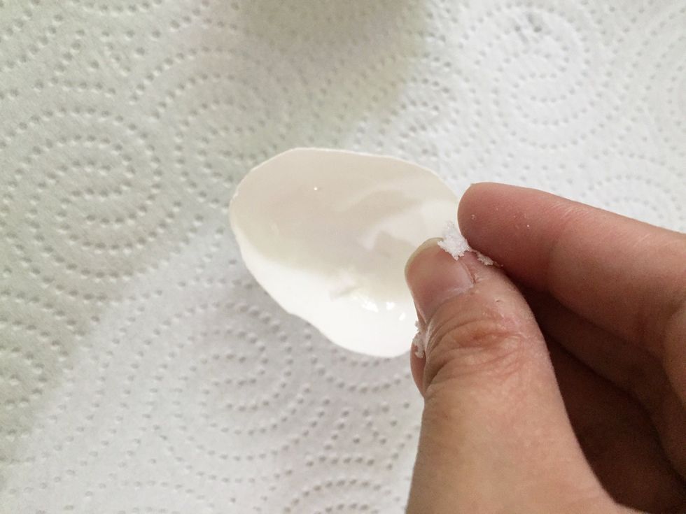 sprinkle alum powder on the inside. make sure all the glue is covered with alum powder then shake off excess.