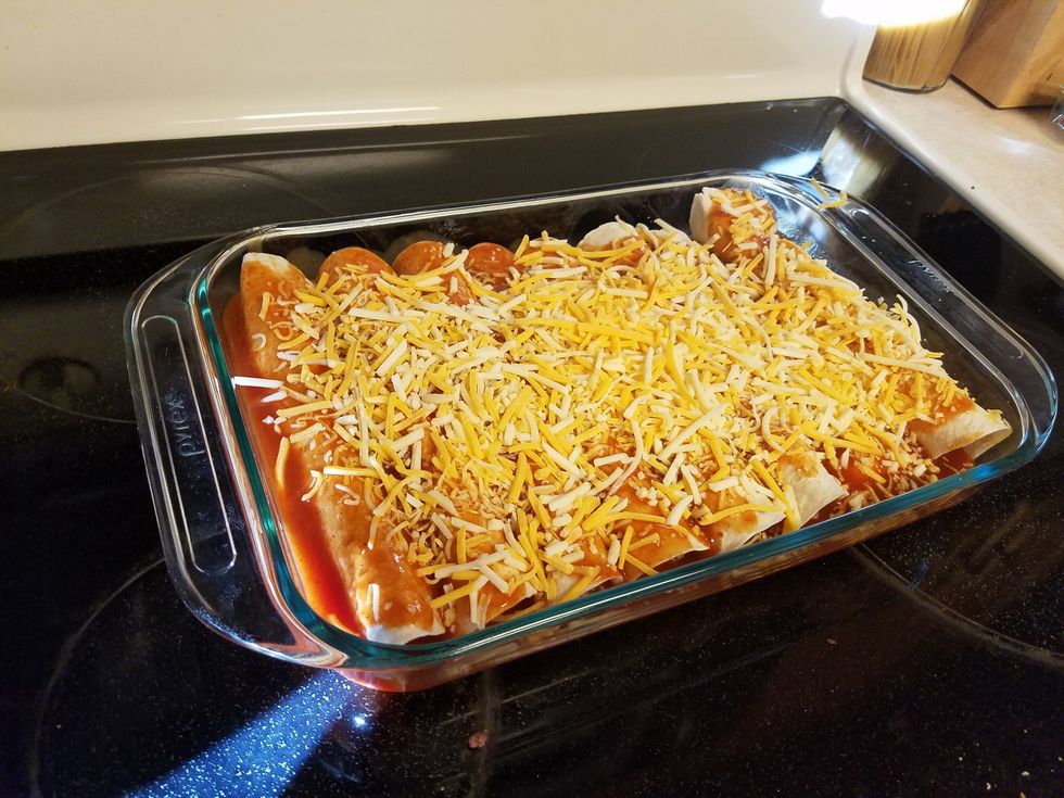 Sprinkle and pour remaining cheese and sauce