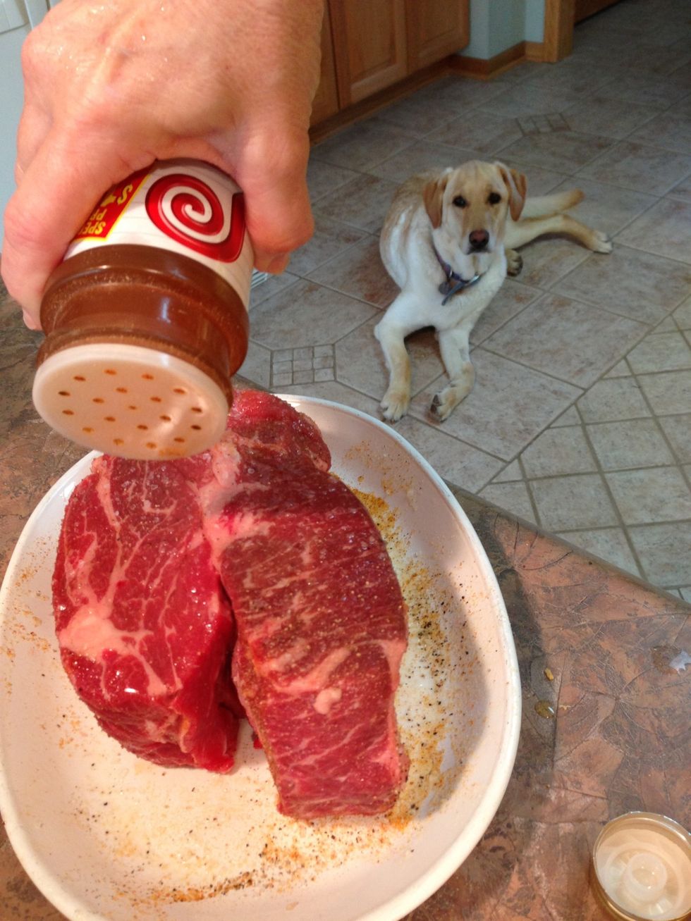 Sprinkle and rub in a generous amount of salt & pepper on all surfaces. I tried a little garlic salt and Seasoned Salt too. Molly keeps a vigil with high hopes.