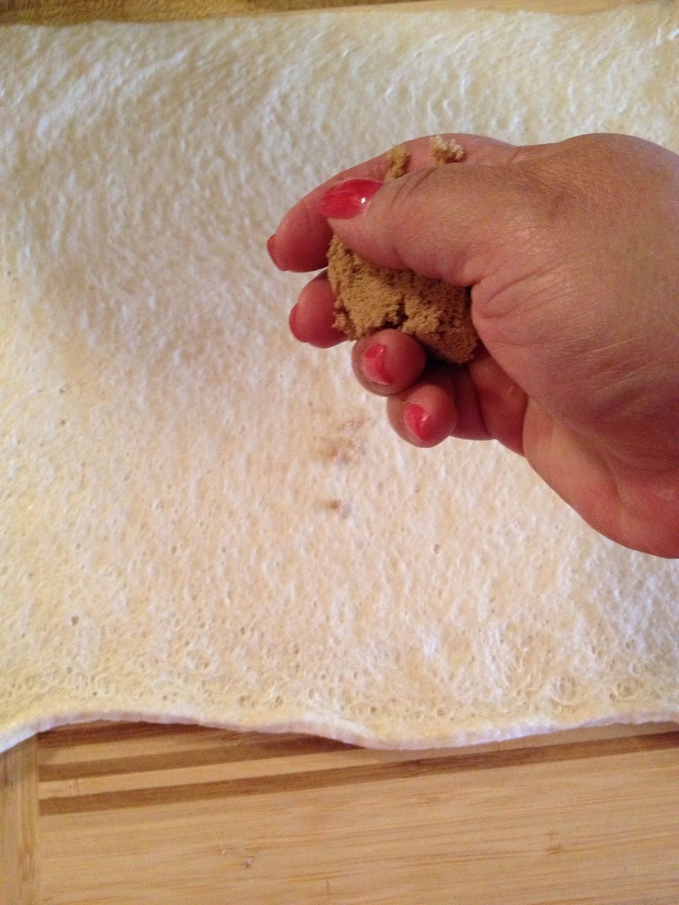 Sprinkle brown sugar on crust