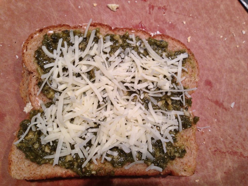 Sprinkle cheese in top of the pesto (just a bit to hold it together)