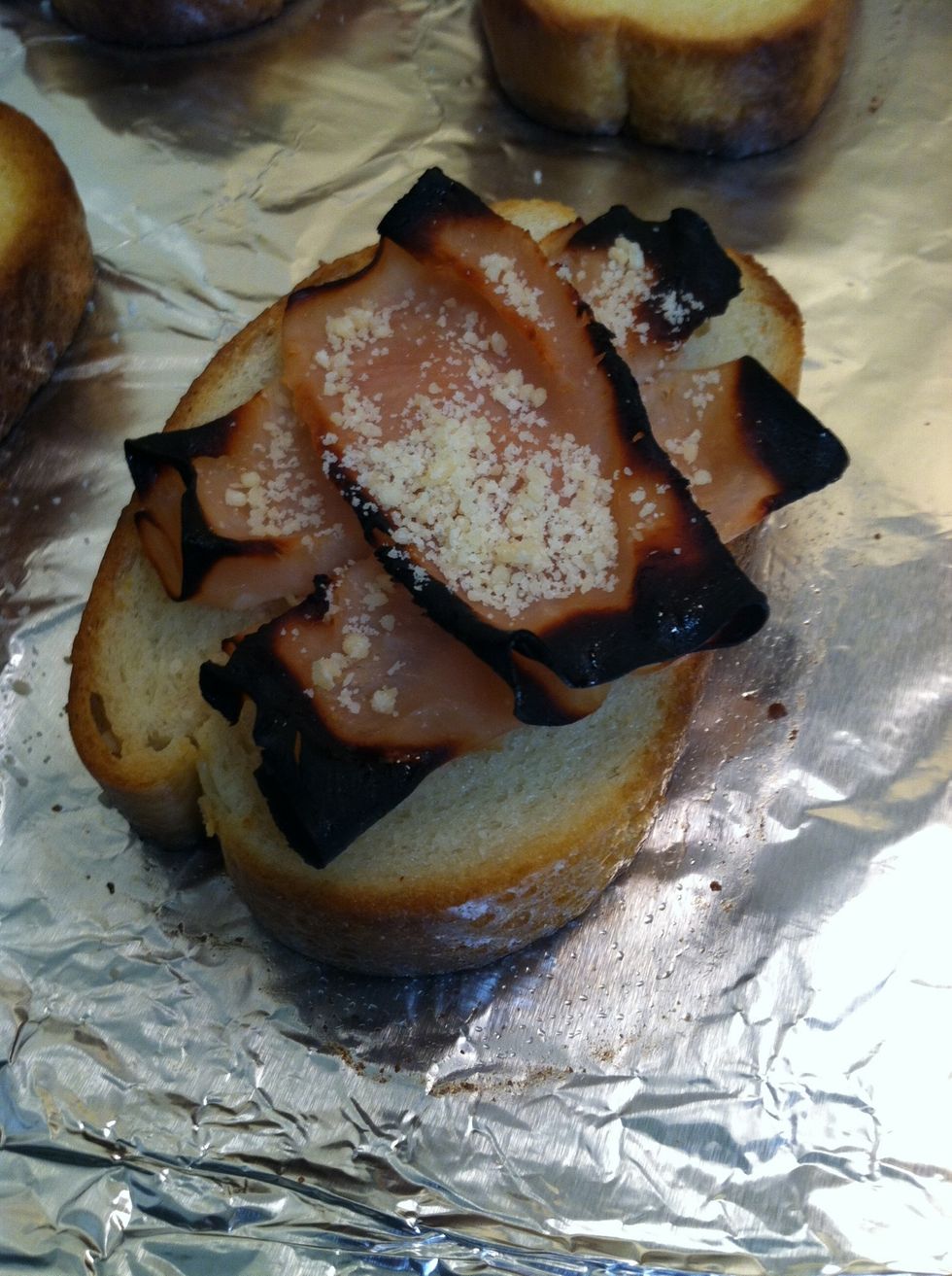 Sprinkle cheese on the bread (if it turns black it is NOT burnt) Your turkey will be crisp