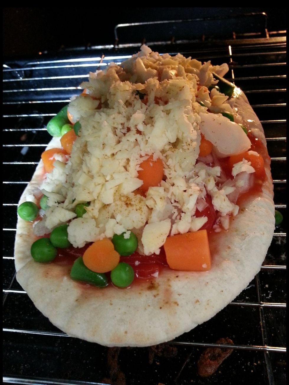 Sprinkle cheese on top! And put it in the preheated oven gas mark 4 for 15/20min. Till the cheese has melted and has gone golden brown.