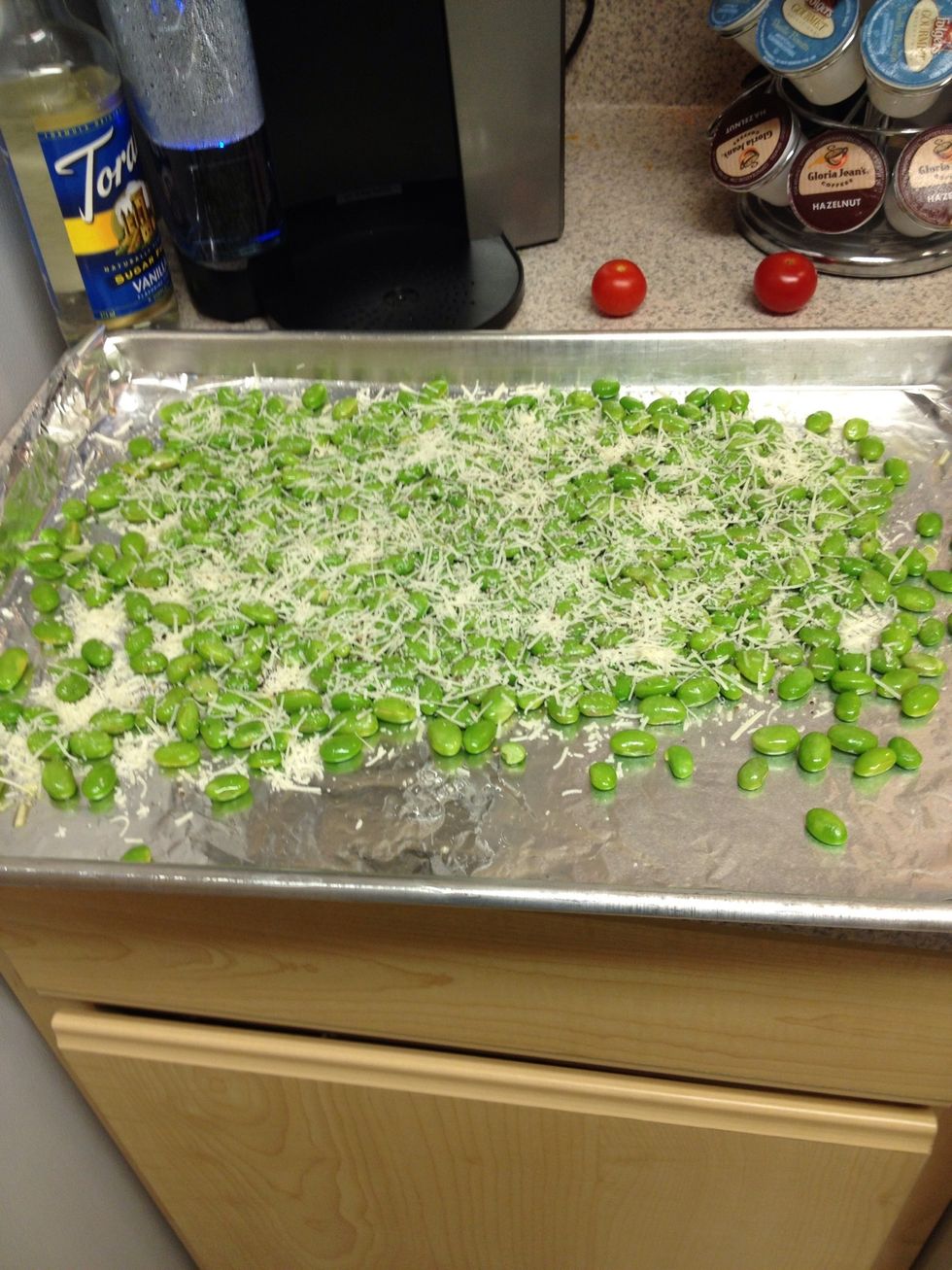 Sprinkle cheese on top of edamame