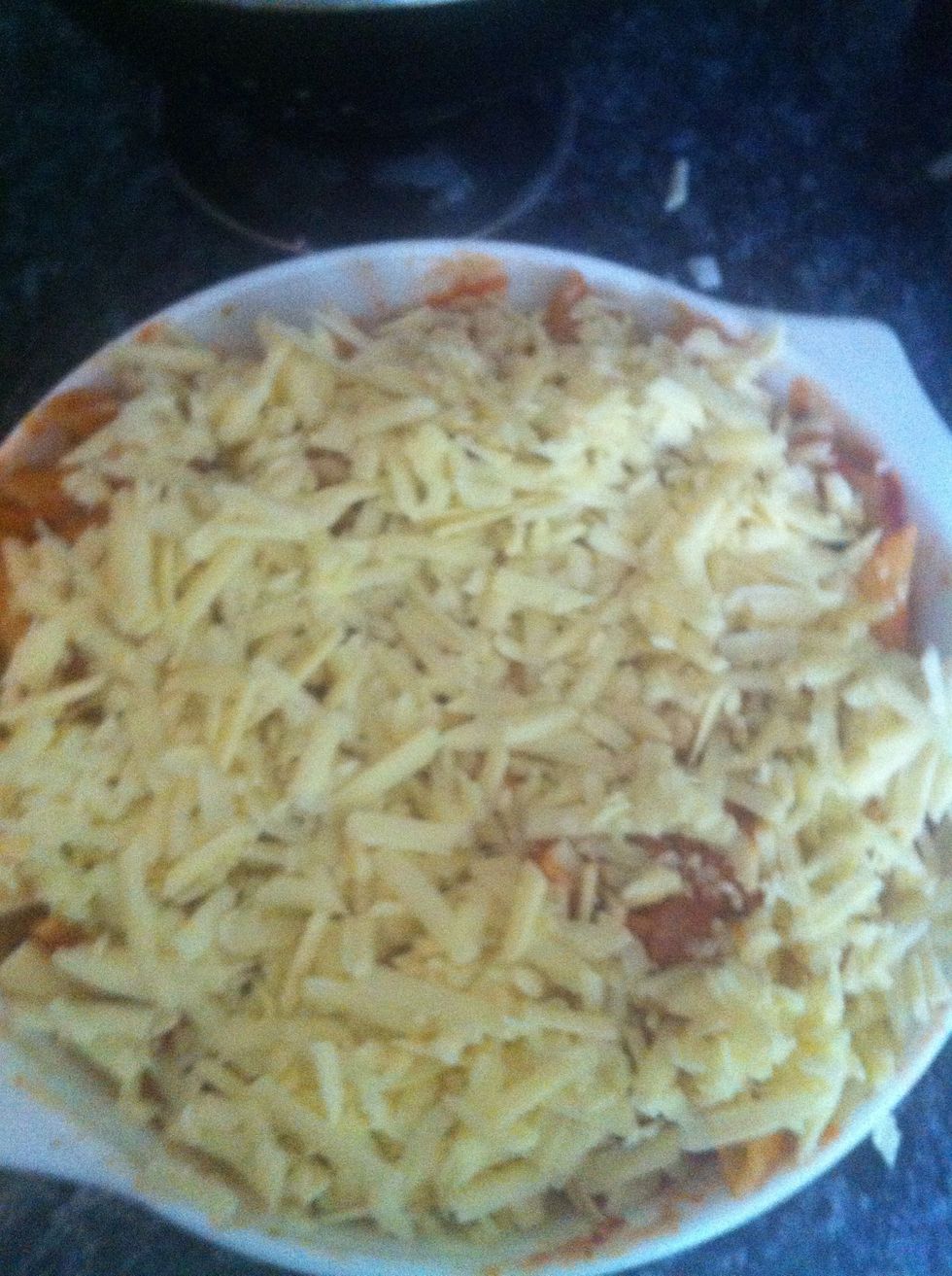 Sprinkle cheese over the pasta bake and put it in the oven (gas mark 6) for 10-15 minuets