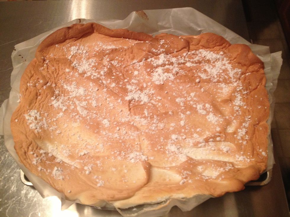 Sprinkle confectioners sugar on top of the meringue.