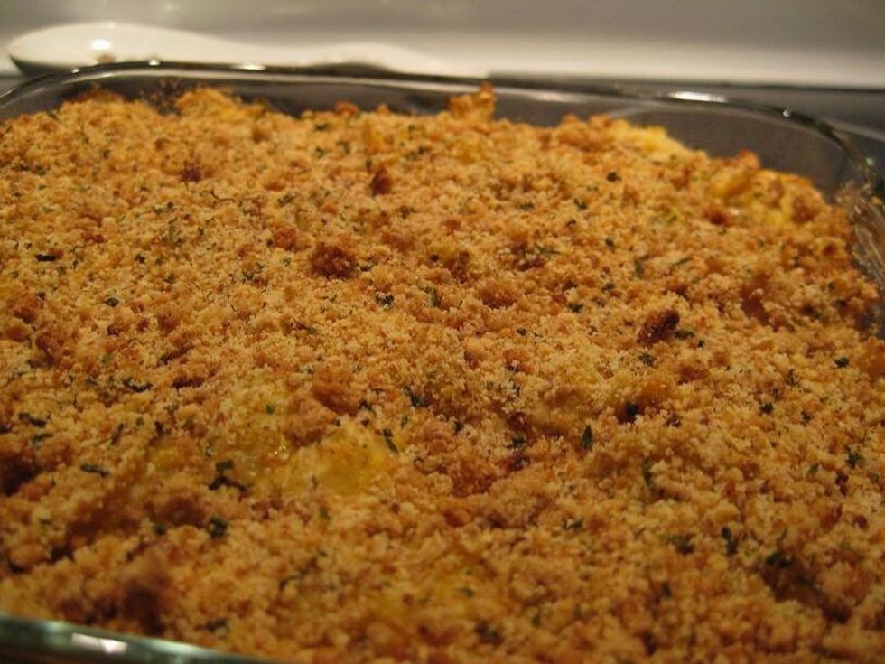 Sprinkle crumbs over the bake, drizzle with olive oil. Bake for 15 minutes then rest for 5 minutes