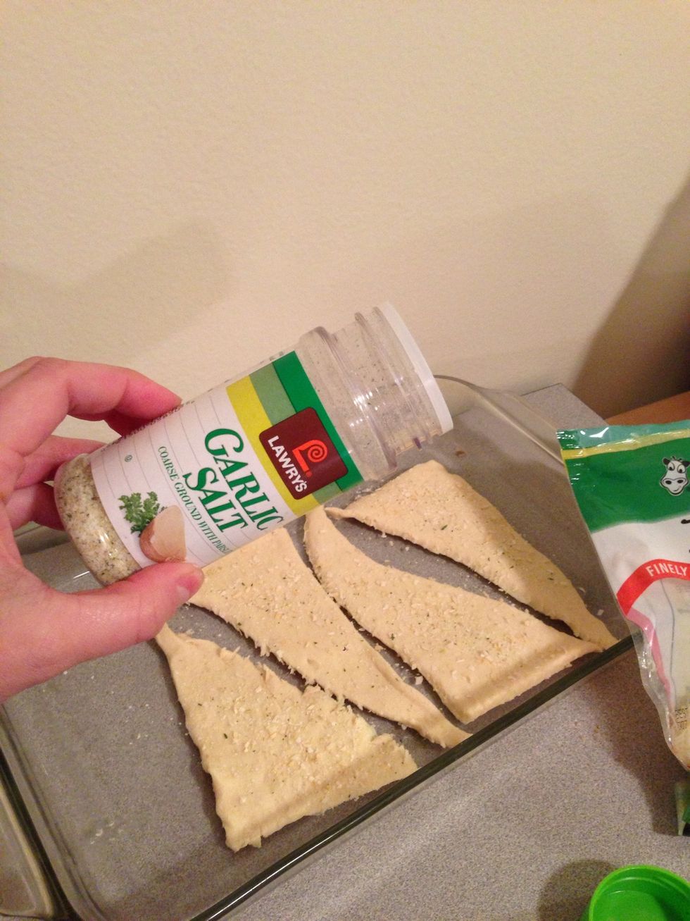 Sprinkle desired amount of garlic salt.