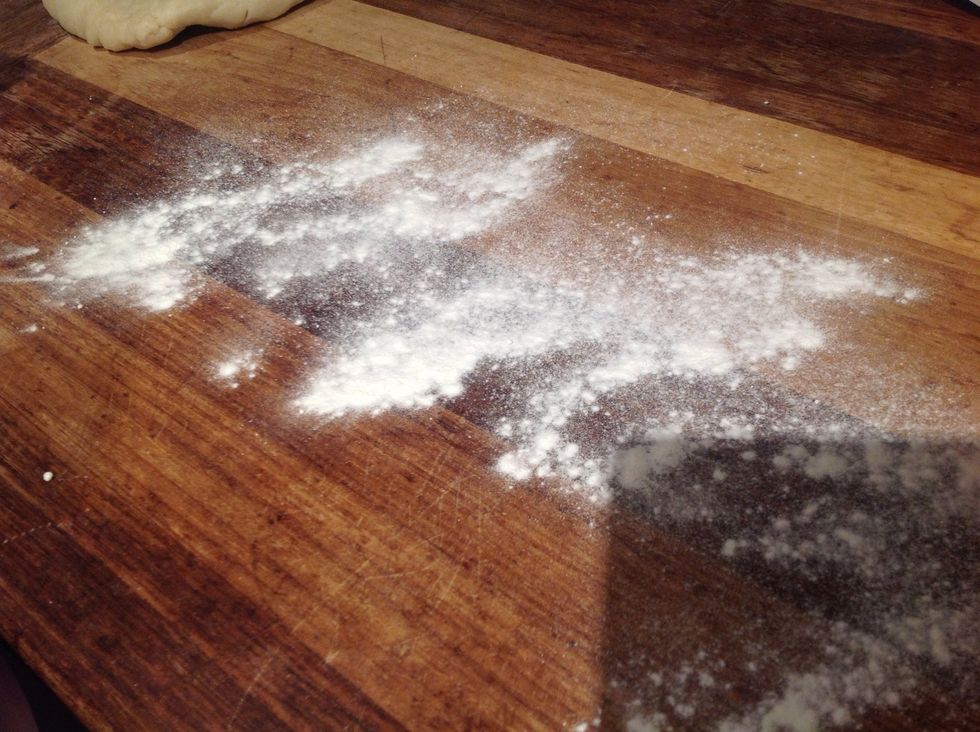 Sprinkle flour on your table surface