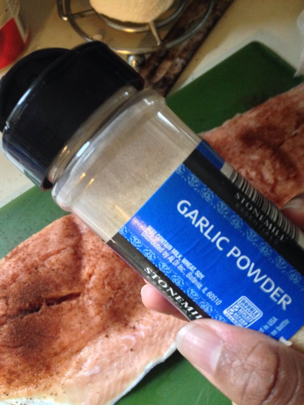 Sprinkle garlic powder all over salmon!