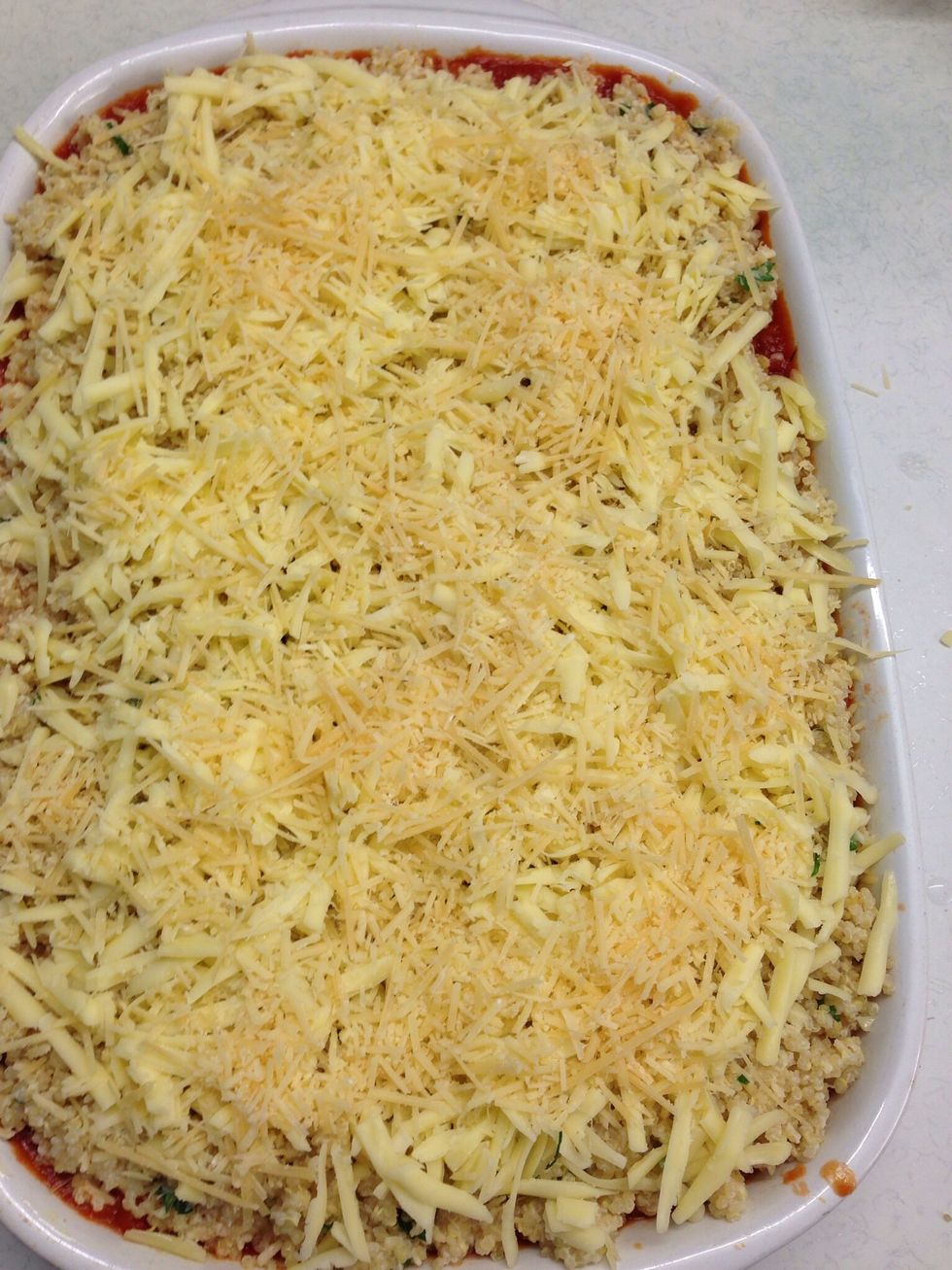Sprinkle generously with grated cheese and Parmesan. Bake in a 200 degree Celsius oven for about 25 minutes