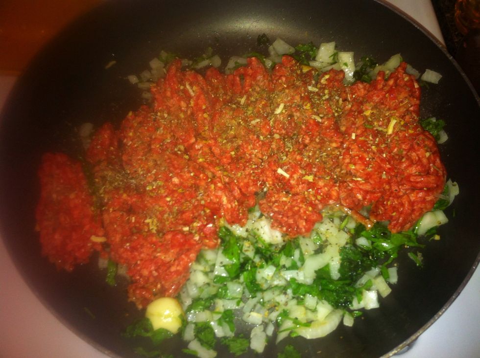 sprinkle Greek seasoning, nutmeg, salt and pepper over the meat.