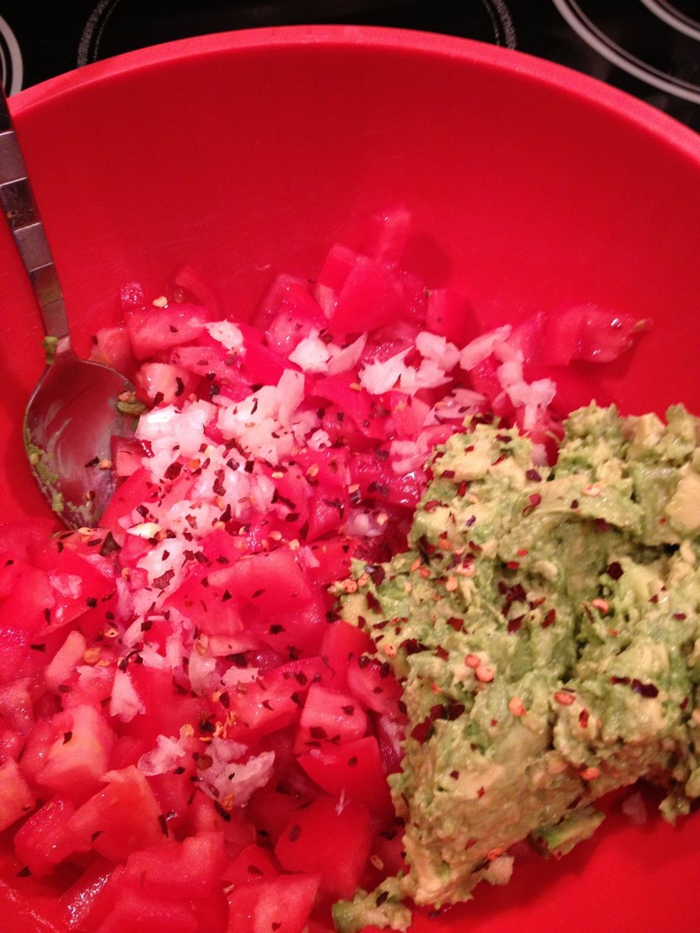 Sprinkle in desired amount of chili flakes and then mix all ingredients together.