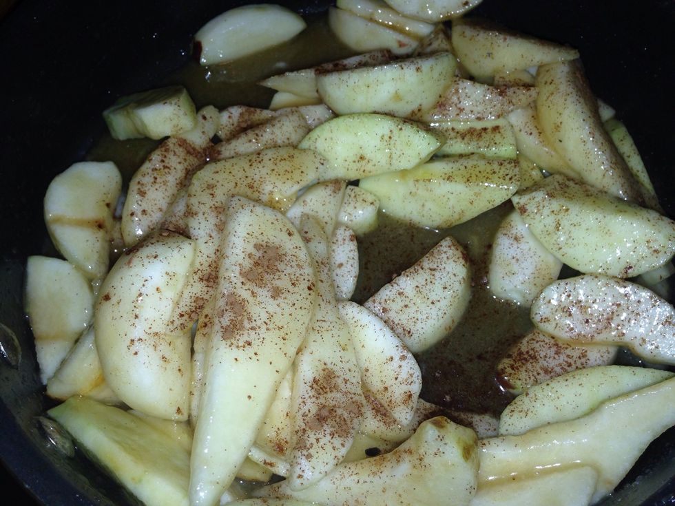 Sprinkle in some cinnamon and stir it up good and let it cook on Adium heat until the fruit is a little soft and the butter and sugar have bubbled up and gotten sorta thick