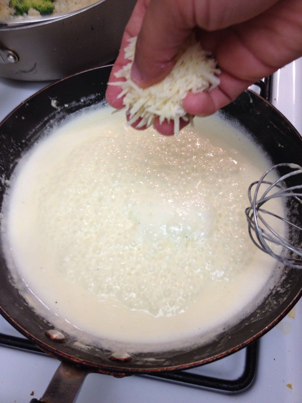 Sprinkle it in and get ready to whisk again.