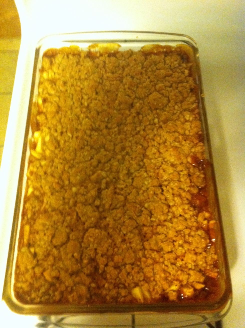 Sprinkle left over crumbly mixture over the top. Bake for 20-25 minutes and then left cool completely before cutting into
