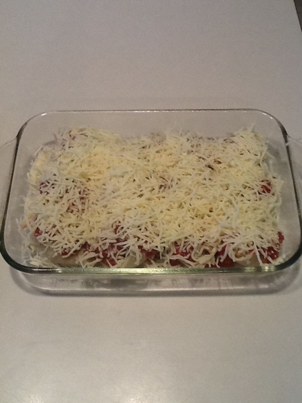 Sprinkle mozzarella over sauce.