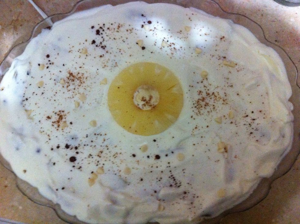 Sprinkle on some coco powder and cinnamon IF you like its flavor Cz many ppl don't like cinnamon n it's aroma. Garnish with a pineapple. Strawberries look the best on it but they're outta season here