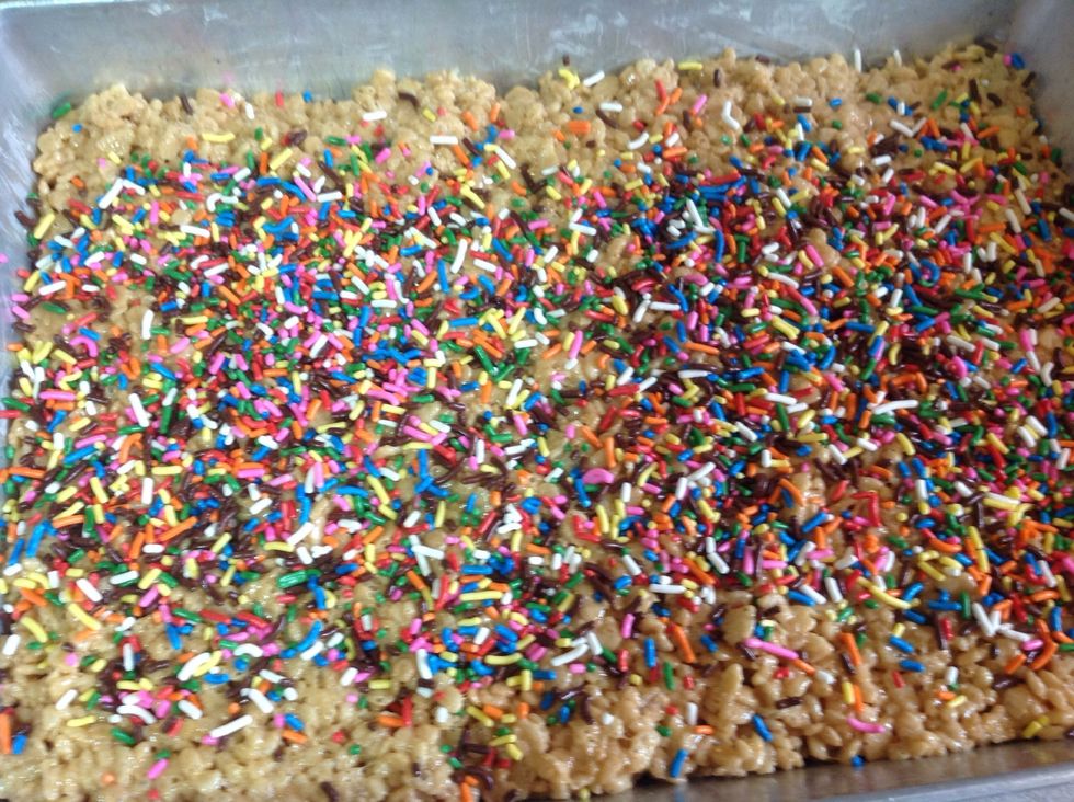 Sprinkle on top until it covers most of the Rice Krispie.