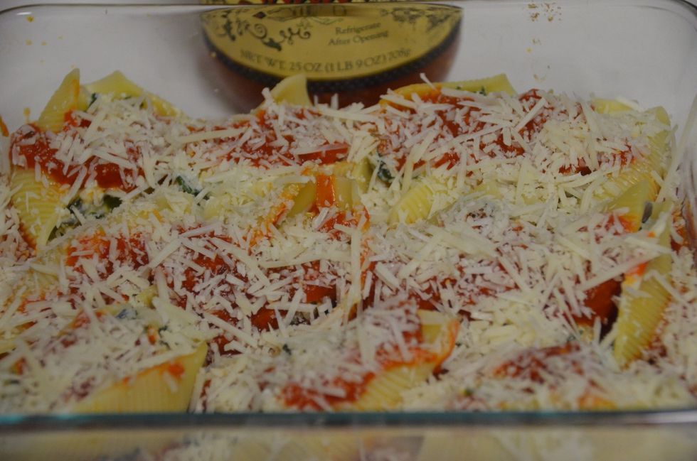 Sprinkle Parmesan cheese and cover with aluminum foil.