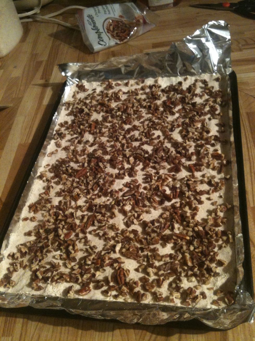 Sprinkle pecans on crust.