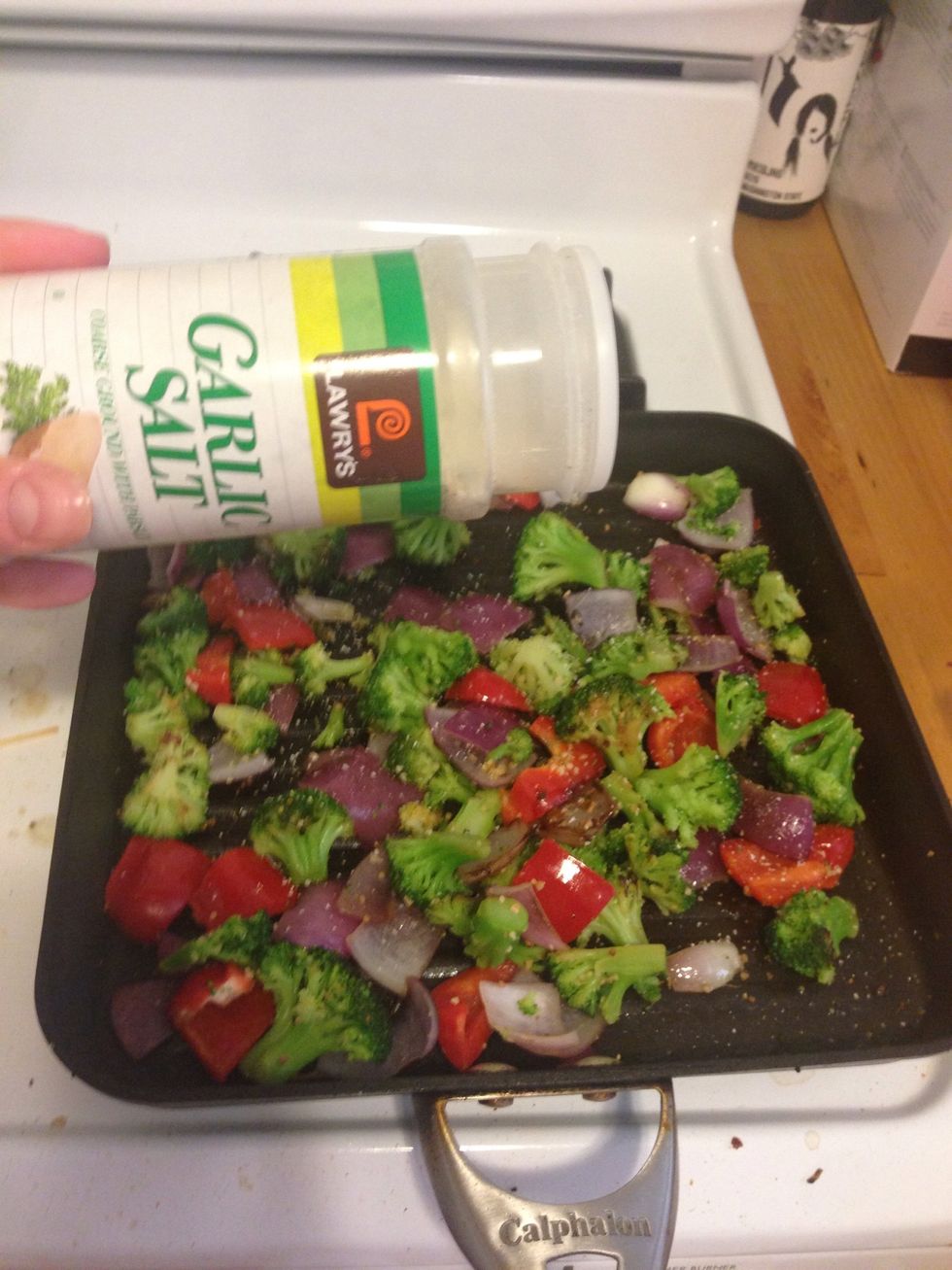 Sprinkle. Pinch of garlic salt on the veggies
