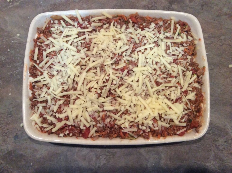 Sprinkle remaining cheese over to cover meat.