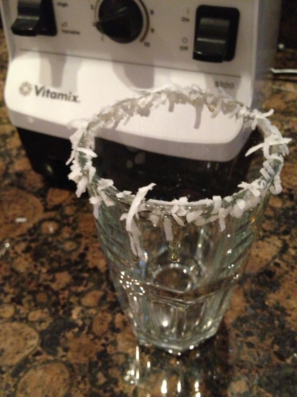 Sprinkle rim with shredded coconut