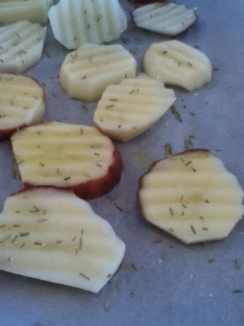 Sprinkle rosemary & Fleur de sel on top. Or just some course sea salt. The Fleur de sel is a type of salt actually made in a special salt mine in France. You can not buy this anywhere but there.