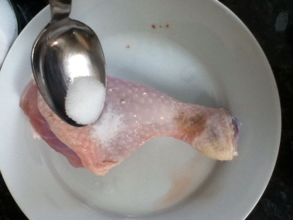 Sprinkle salt on chicken. Marinate it.