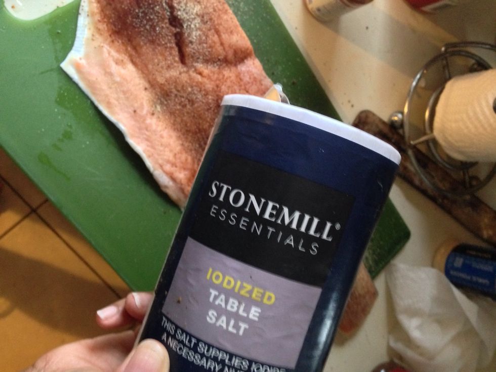 Sprinkle salt over salmon! Don't get heavy handed with the salt, use your judgement
