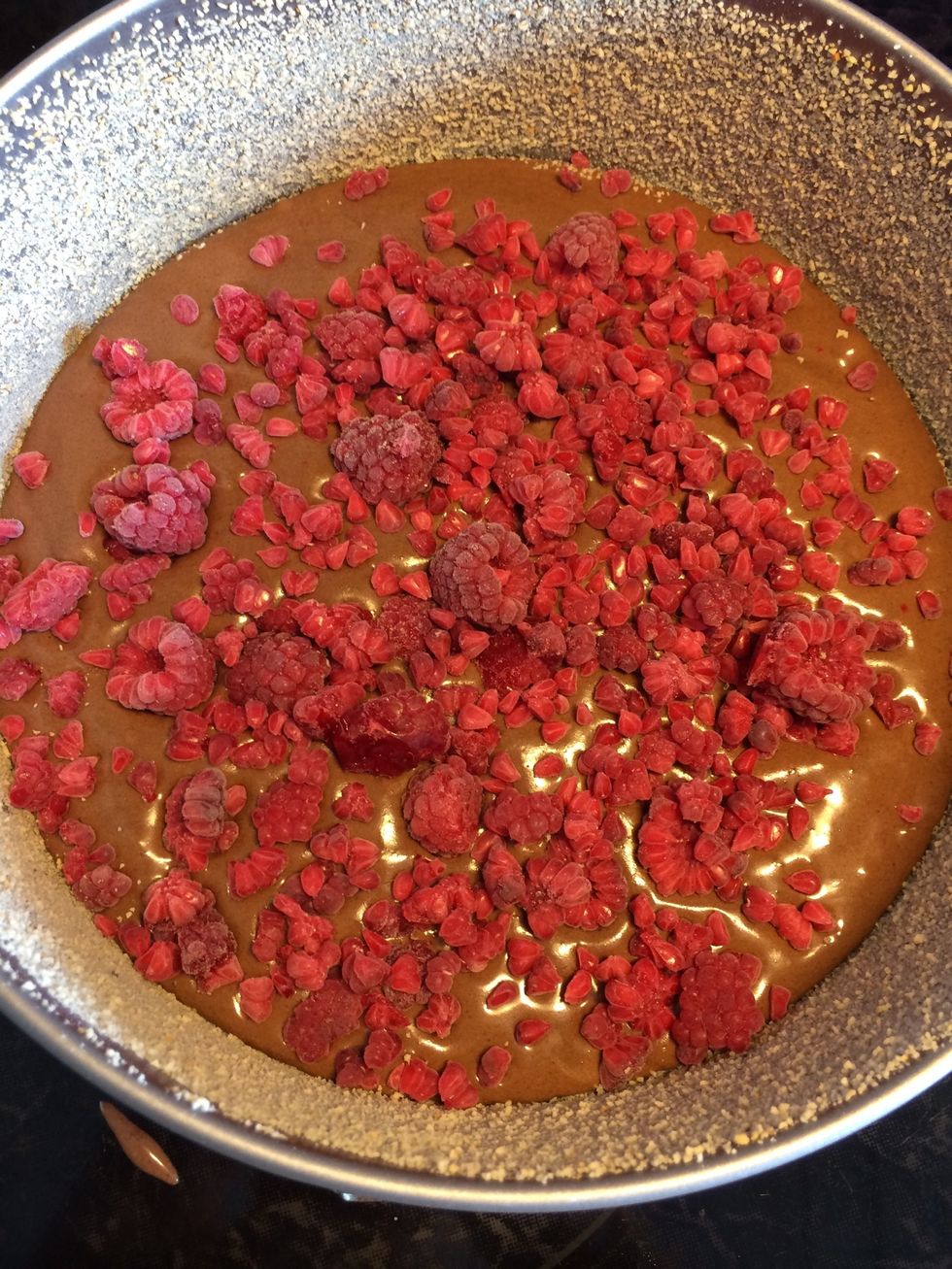 Sprinkle som raspberries on. Mine are frozen and it's just as good as fresh.