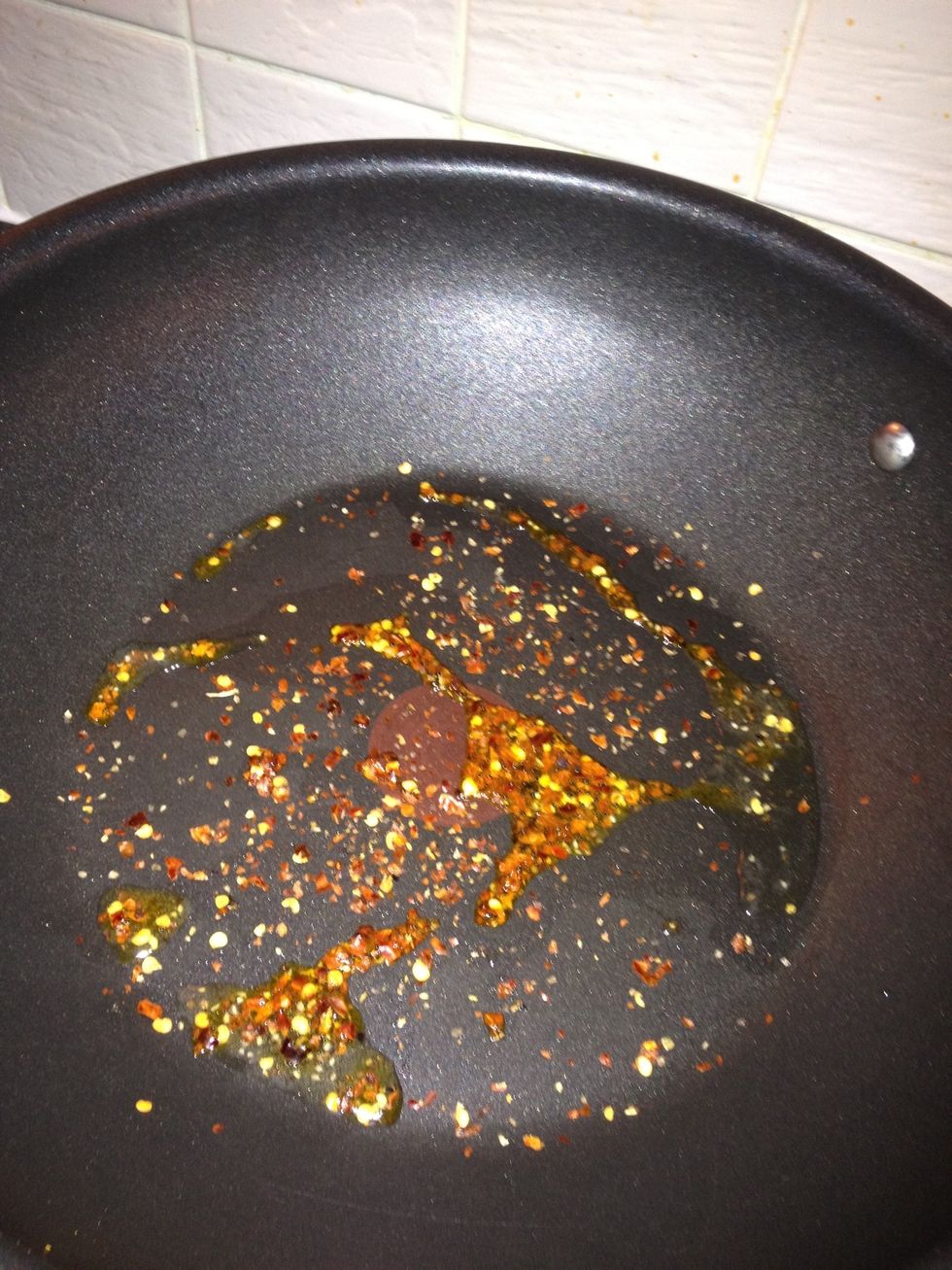 sprinkle some chilli flakes. I like it spicy, so feel free to add less