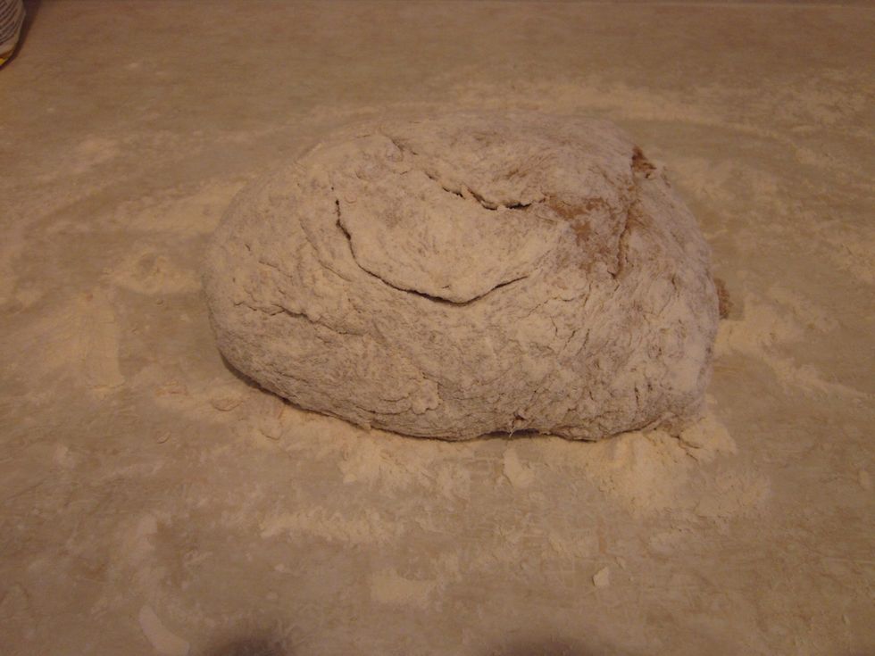 Sprinkle some flour on the dough too. Don't worry about adding too much extra flour. As long as it stays sticky you are good to go