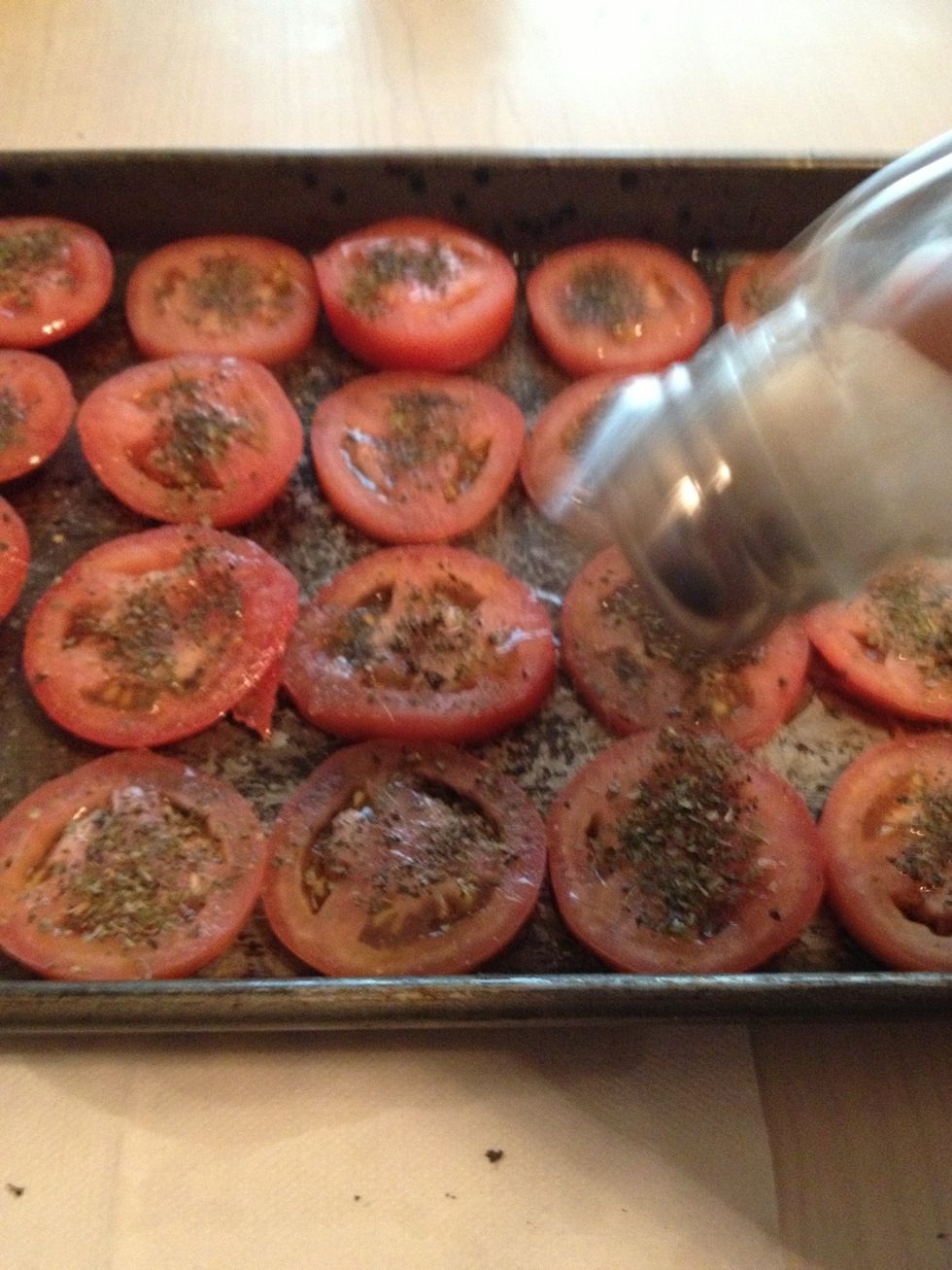 Sprinkle some salt on the tomatoes.