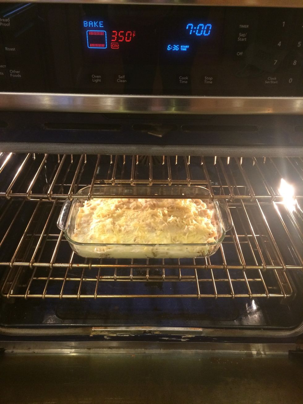 Sprinkle that extra shredded cheese over the top and pop in the preheated oven (350) for 15-20 min. I like the top nice and crunchy so usually that takes about 20 min.