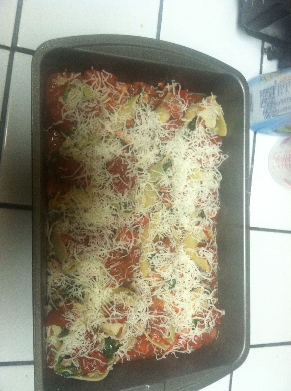 Sprinkle that mozzarella cheese and cover the pan with aluminum foil. Place in oven for 30 minutes.