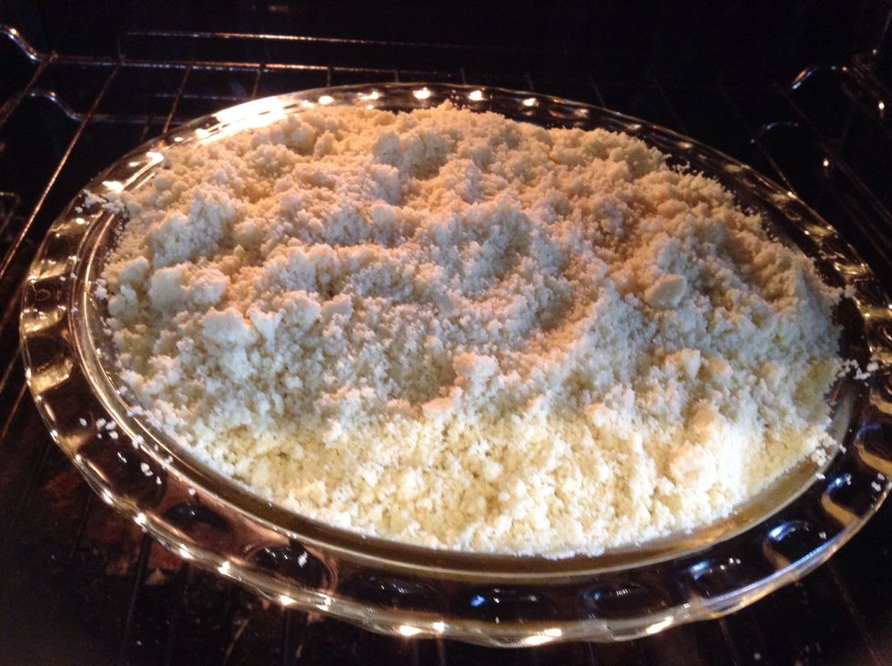 Sprinkle the bread crumbly mixture on top and place in oven