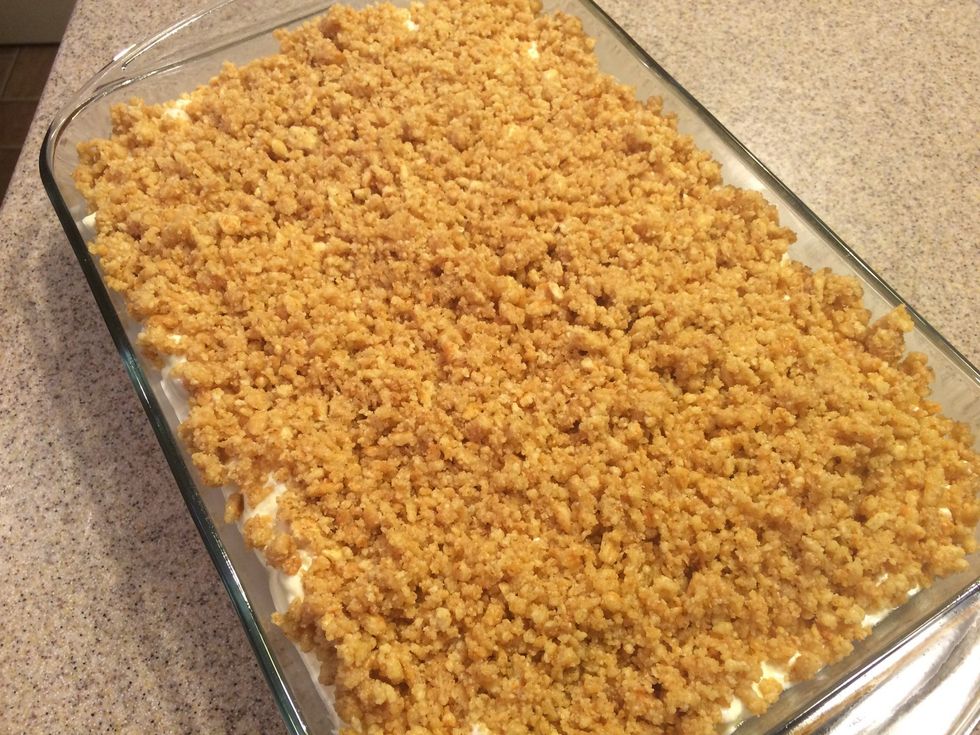 Sprinkle the butter, and crackers on top.