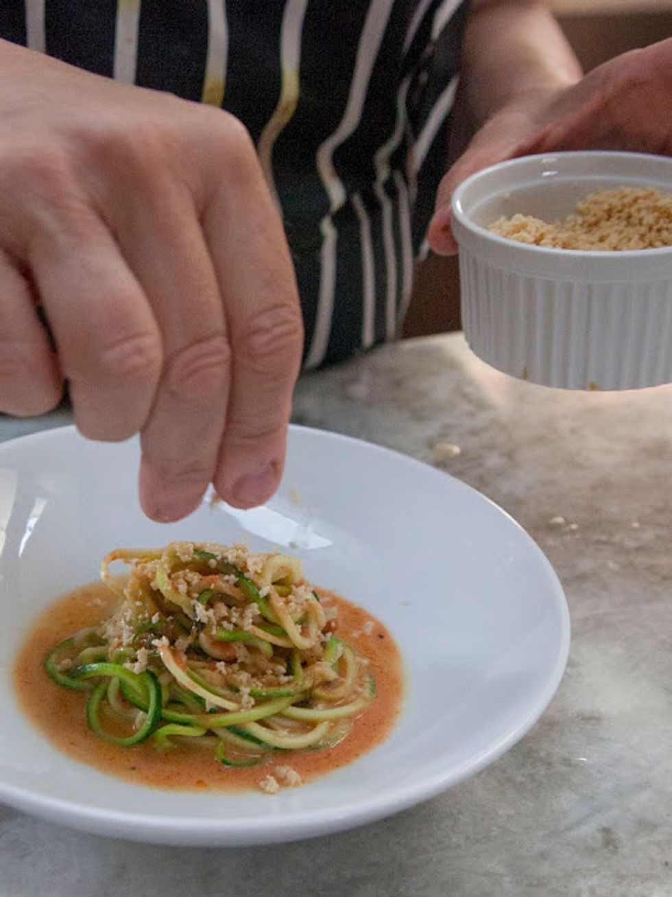 Sprinkle the finished serving with a crumble of peanut powder and you're good to go.