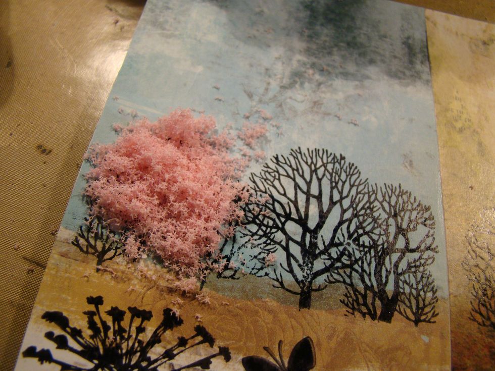 Sprinkle the Flower Soft on top of the glued area and pat gently. Pour the excess back into your container and continue to the next area to glue.