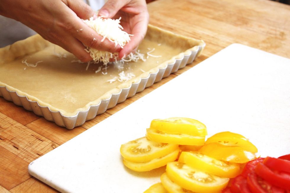 Sprinkle the mozzarella over the bottom.